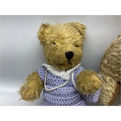 Mid-20th century large plush covered woodwool filled teddy bear with revolving head, applied eyes, stitched nose and mouth and jointed limbs H67cm; three other mid-20th century teddy bears including one by Pedigree; and soft toy donkey with applied glass eyes and open mouth (5)
