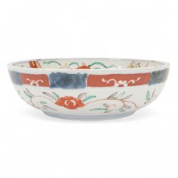 Japaneses imari bowl, decorated to the interior with a crane within a landscape, birds and insects, the external decoration of foliate scrolls, D25cm 