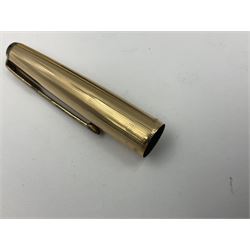 Three rolled gold Parker fountain pens, comprising an example with a gold nib marked 14K 585 and barrel with a shell stamp, a Parker 61 fountain pen with inset gold arrow to the nib, and another similar, all with striated decoration and arrow clips to the caps, L13cm, one with box