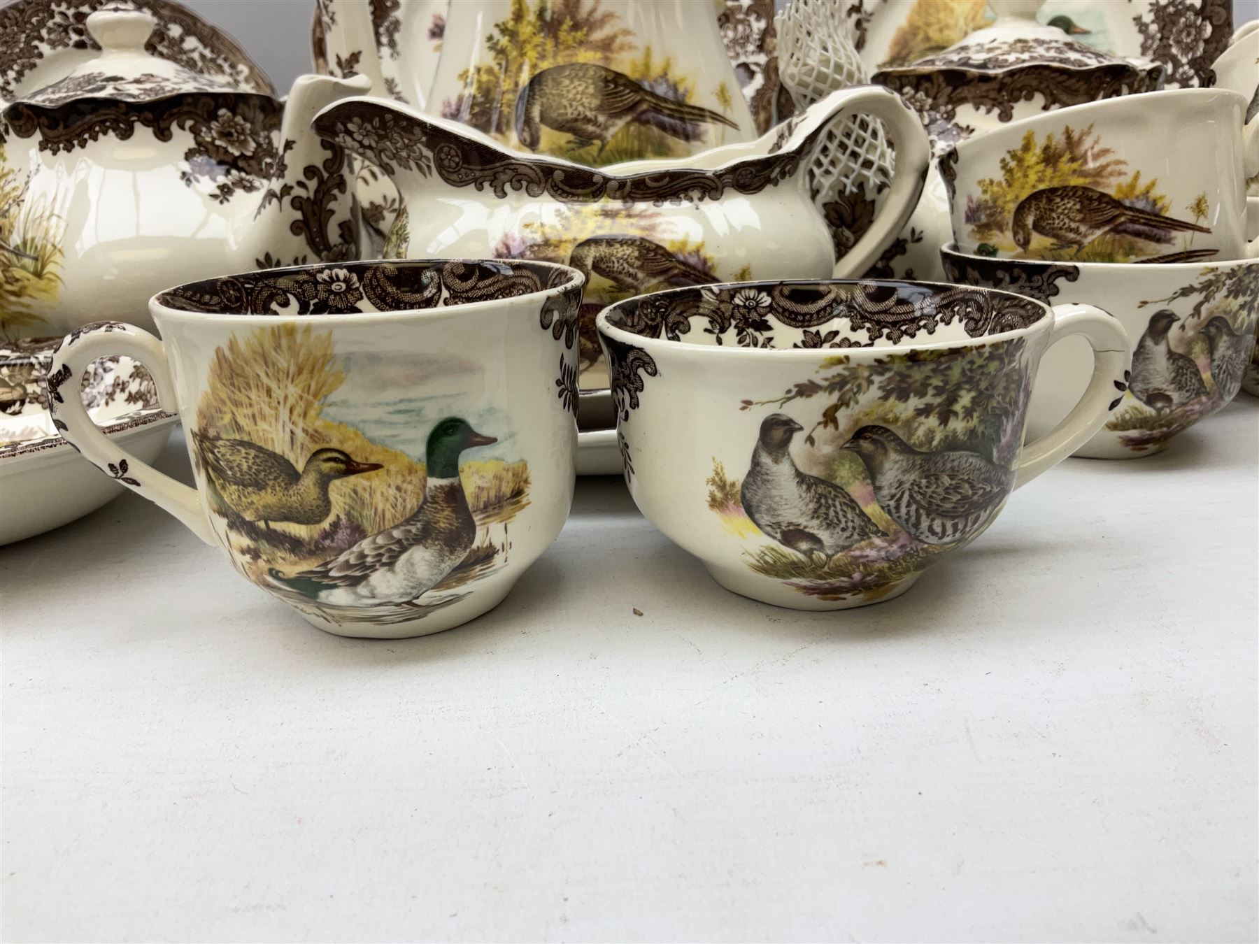 Royal Worcester Palissy Game Series pattern tea and dinner wares, to include two teapots, coffee pot, twelve cups and saucers in two sizes, four dinner plates etc (40) 