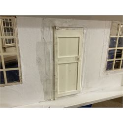 Modern scratch-built Palladian style wooden dolls  house as a 19th century double fronted two-storey property with simulated brick and stone walls under a removable simulated slate hipped roof; the triple hinged front elevation opening to reveal six rooms with central hall, stairs and landing L94cm H56cm D40cm