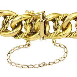 18ct gold rope twist and polished curb link bracelet, stamped 750