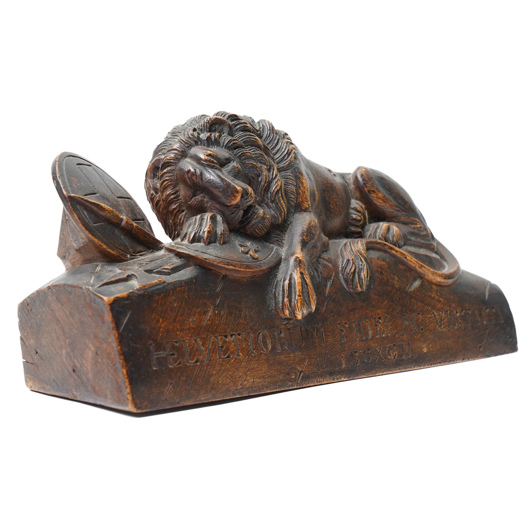 After Bertel Thorvaldsen (Danish 1770-1844): 'The Lion of Lucerne', 19th century walnut carving after the Swiss stone monument, commemorating the Swiss Guards who were killed in 1792 during the French Revolution, H14cm W27cm