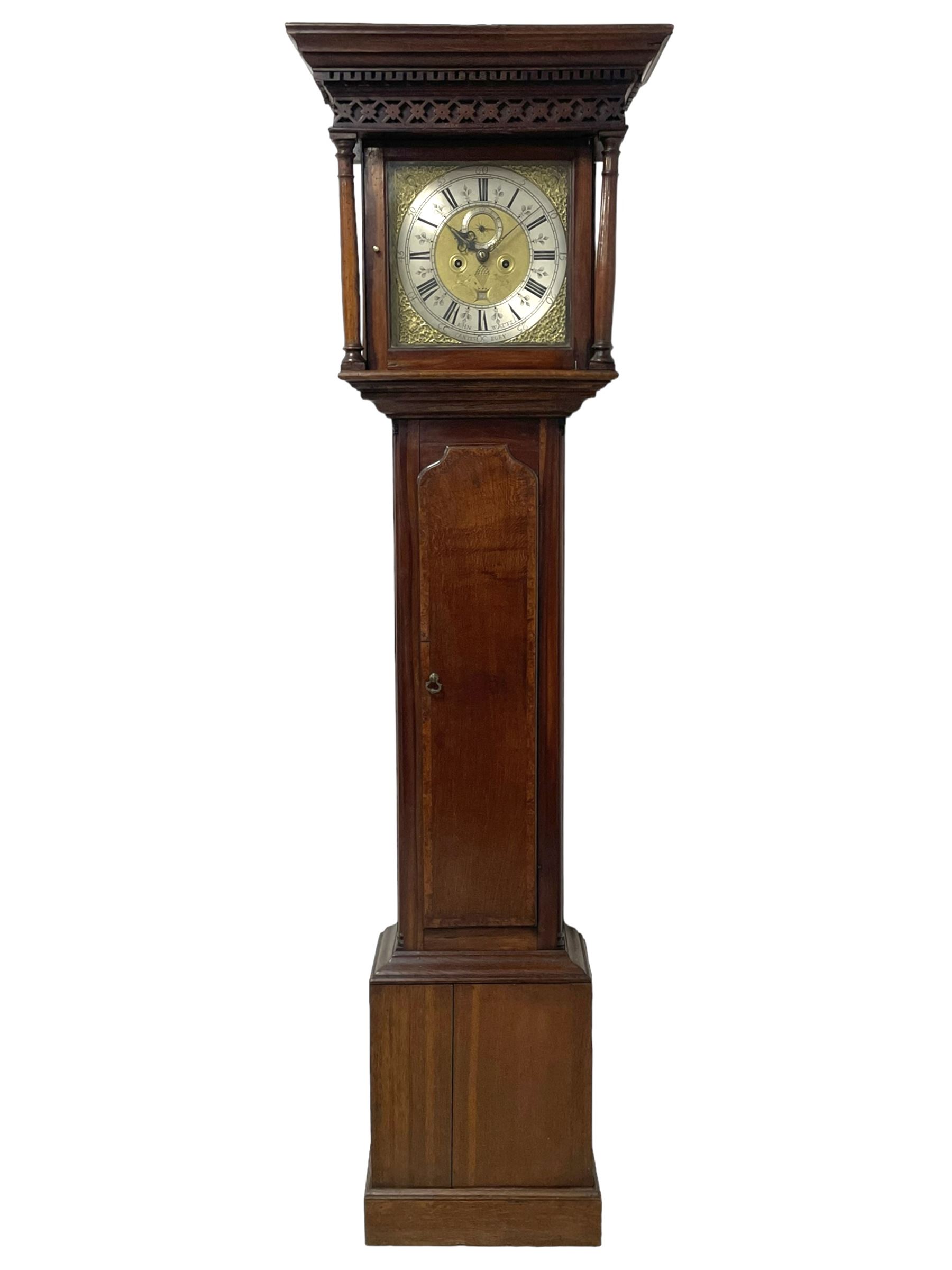 John Watts of Canterbury - early 18th century 8-day oak longcase clock, with a flat topped hood, broad cornice, dentil moulding and blind fret beneath, baluster turned pilasters with wooden capitals flanking the square hood door, trunk with recessed beaded edge and a long ogee topped door with crossbanding, plinth with applied skirting, square brass dial with matching steel hands, cast spandrels and a matted and engraved centre, date aperture, seconds ring and ring turned winding apertures, silvered chapter ring with Roman numerals, five minute Arabics, minute and quarter hour tracks, five pillar movement with a recoil anchor escapement and inside countwheel strike, sounding the hours on a bell. With weights and pendulum.