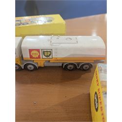 Three Dinky Toys diecast vehicles, comprising Field Marshall Tractor no. 301, Shell BP Fuel Tanker no. 944 and Snow Plough no. 958, all boxed