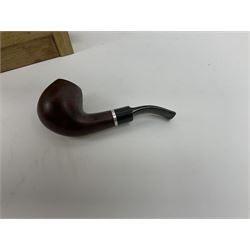 Pipes and two tiered wooden rack together with eleven pipers, including briar pipe carved as a wolf, Sea Dog straight pipe, John Brumfit pipe, meerschaum pipe ect, pipe rack H29.5cm