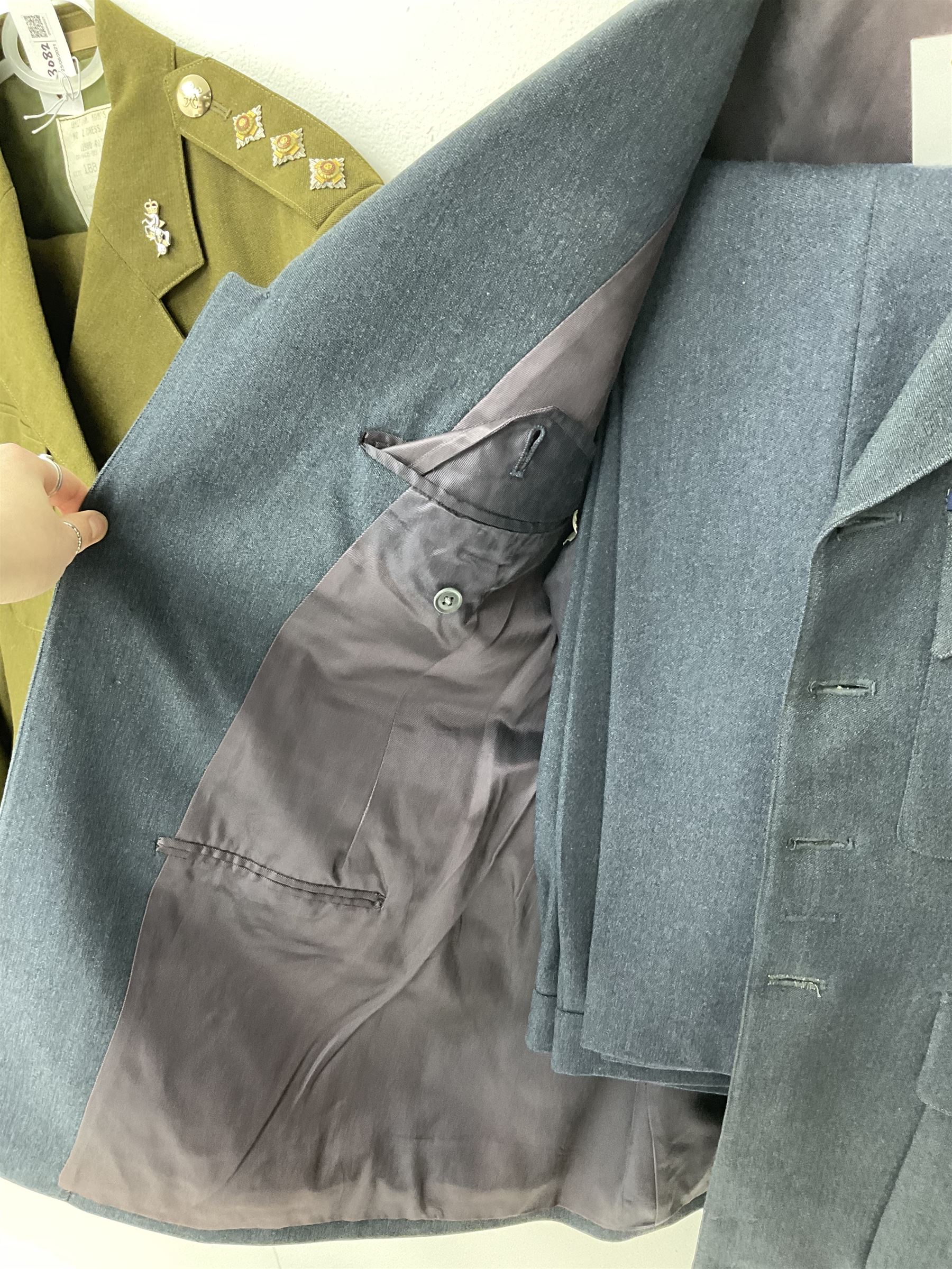 RAF Flight Lieutenant's uniform with peaked cap and WW2 ribbon bar; WW2 gas mask in blue canvas bag dated 1942; flying helmet date 1984; and British Army Major's uniform with Staybrite buttons and peaked cap