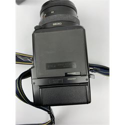 'Zenza Bronica SQ-B' camera fitted with 'Zenza Bronica Zenzanon-PS 1:28 f=80mm' lens, 'Zenza Bronica Zenzanon-PS 1:4 f=150mm' lens and 'Zenza Bronica Zenzanon-S 1:35 f=50mm' lens, with an instruction booklet