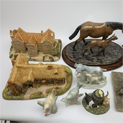 Two Royal Doulton figures; Kirsty and Autumn, Heredities Creamware Horse group, large model of a Black Labrador, two Milestones house models 'Tuthill Manor' and 'Washington', Sylvac Toothache Dog no. 2455, Capodimonte and other figures 