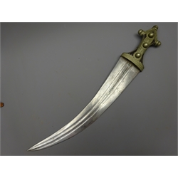  Middle Eastern dagger Jambiya with 35cm curving double fullered blade, white metal overlaid hilt and scabbard and leather strap 52cm overall  