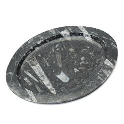 Oval dish with orthoceras inclusions W26cm and a similar smaller dish (2)