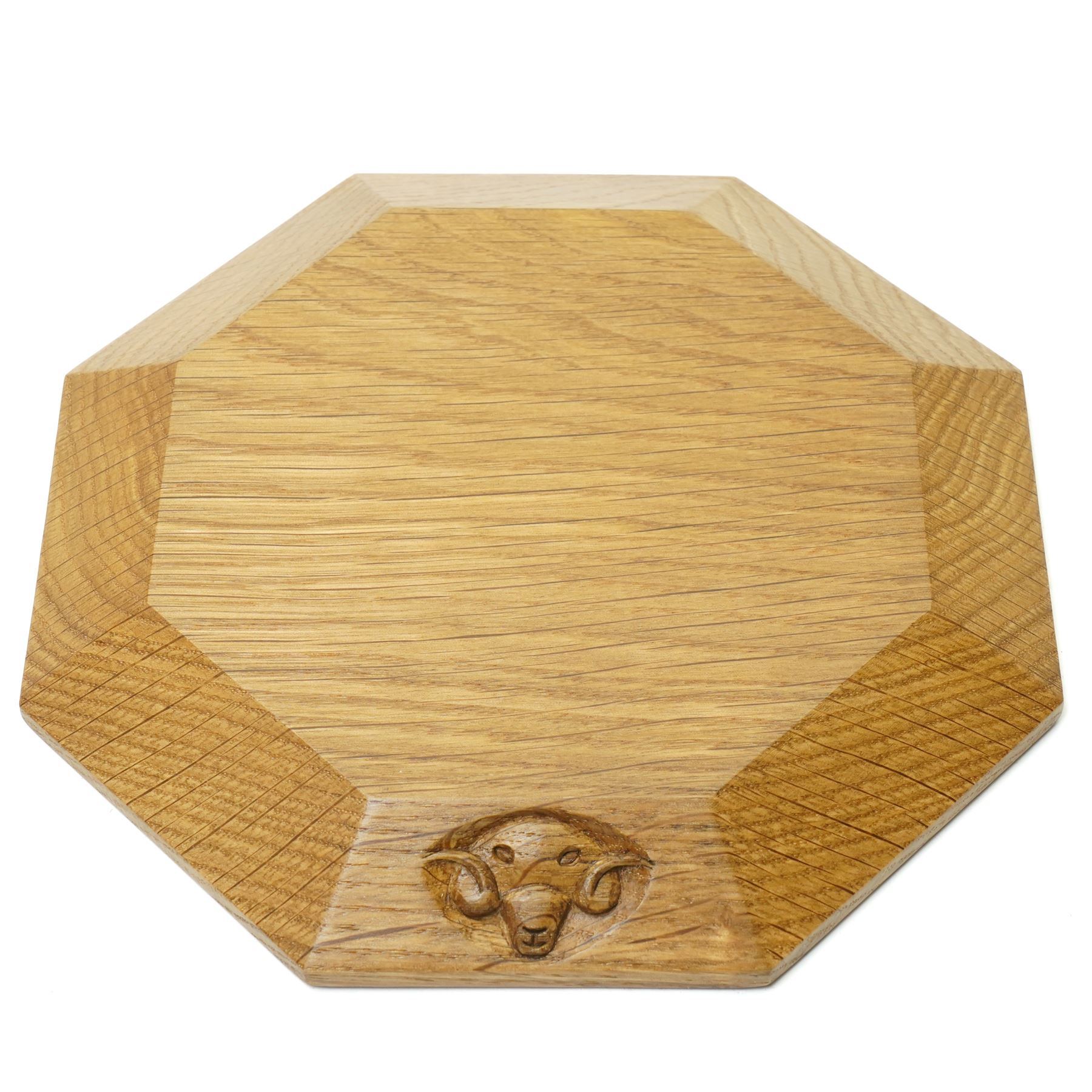 Ramman - oak teapot or plant stand, of octagonal form with chamfered edge, with carved ram head signature, by Terry Harrington of Leyburn