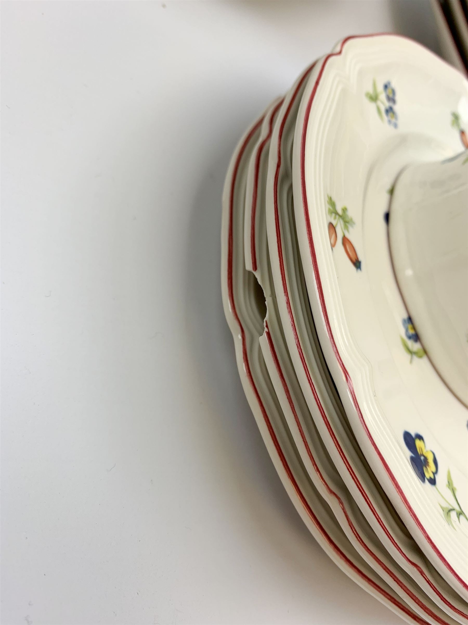 A Villeroy & Boch dinner wares decorated in the Petite Fleur pattern, comprising eight dinner plates, six salad plates, four side plates, eight bowls, two tureen and covers, one tea cup and saucer , coffee mug, open sucrier, and milk jug. 