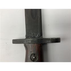 Australian Owen sub-machine gun bayonet, the 25.5cm fullered steel blade marked '53'; in metal bound wooden scabbard marled MA53 L41cm overall