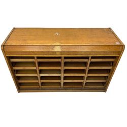 Early 20th century oak haberdashery shop cabinet, fitted with twenty slides