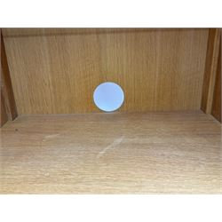 Laura Ashley - contemporary Milton oak display cabinet, featuring single door with two glass panels and pewter effect handle, enclosing one fixed oak shelf and two adjustable glass shelves, access hole at the bottom shelf, over single drawer with matching handle, on square legs