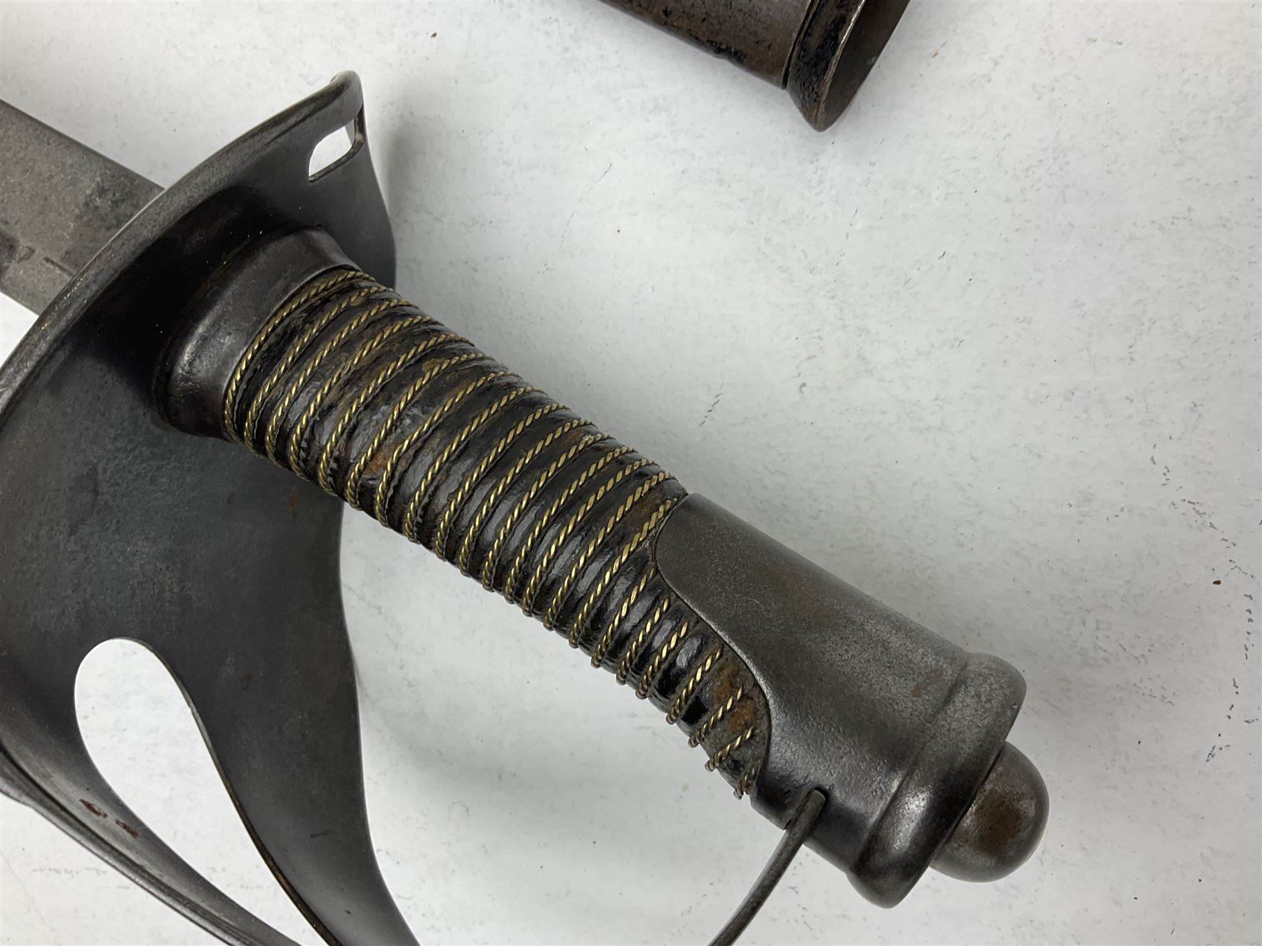 19th century Imperial German army heavy cavalry officers sword by Schnitzler and Kirschbaum, with 89cm single fullered steel blade and sheet steel basket hilt with teardrop cut-out and wire-bound leather grip L107.5cm overall; in steel scabbard with two suspension rings; and British Army 1822 Pattern Infantry Officer's sword in associated scabbard (2)