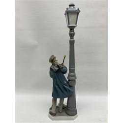 Five Lladro figures, including The Lamp Lighter no 5205,  Girl and Kittens no 6102, Cat no 5113 etc