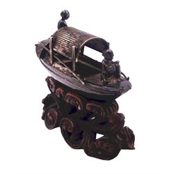 Chinese miniature silver model of a junk, with character mark to stern, mounted upon a carved wooden stand, overall H5cm L6.5cm