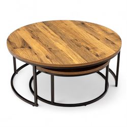 Contemporary nesting circular coffee tables, oak effect tops raised on black metal frames (2) 
