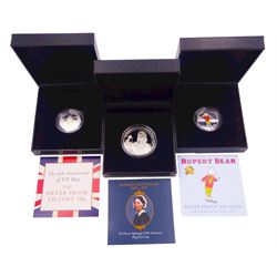 Three silver proof coins comprising Rupert Bear fifty pence, 75th Anniversary of VE Day fifty pence and The Florence Nightingale 200th Anniversary five pounds, all cased with certificates