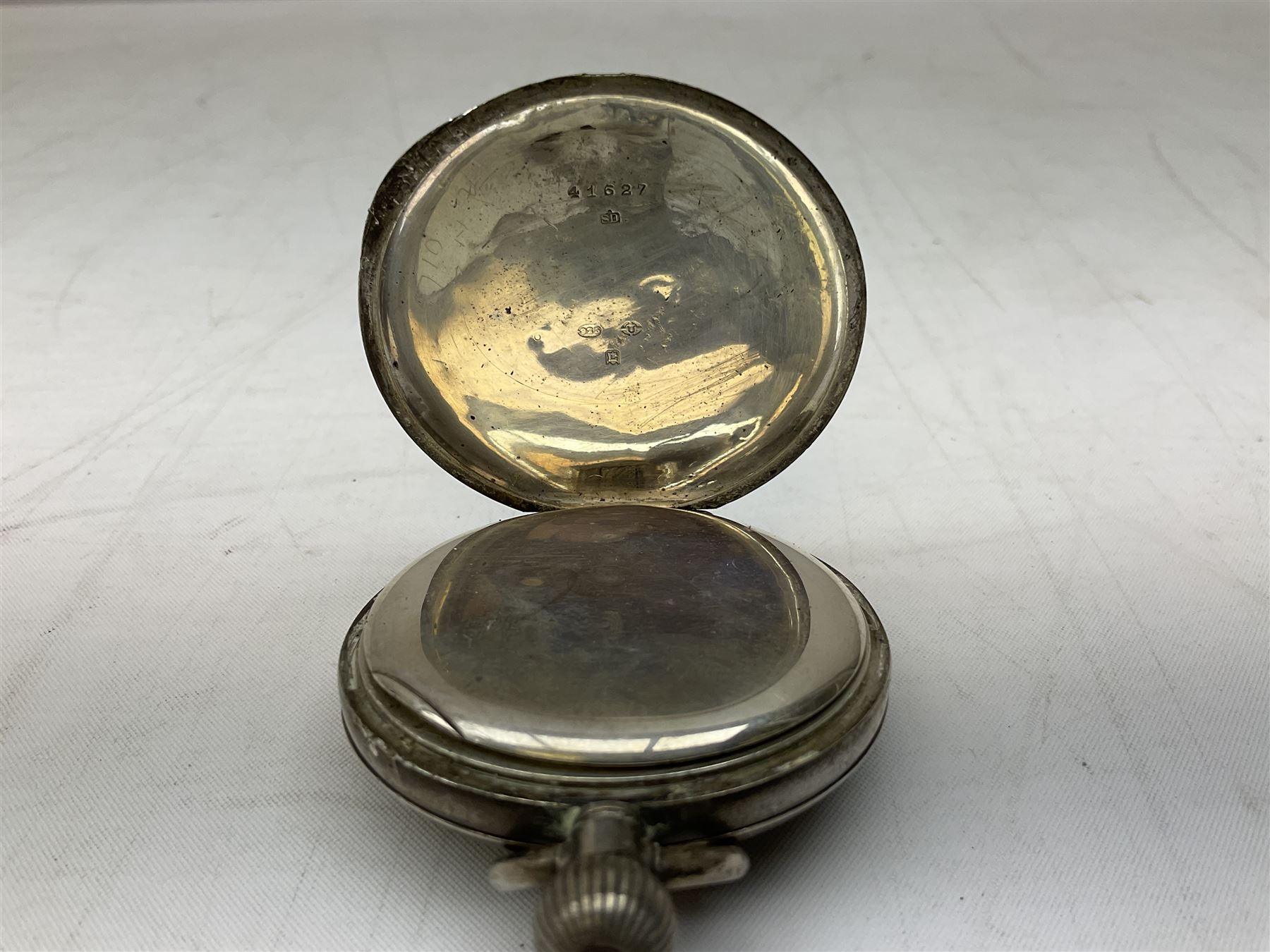 Miniature all nickel 2mm pin fire single shot pistol with engraved grip L4.5cm; together with a .925 silver half hunting cased keyless wind pocket watch inscribed 'Presented to Pte. P. Sizer By No.2 Company 1st Battalion Lincolnshire Regmt For Gallant Conduct Nr. Cork (Ireland) 31.7.20' (2)