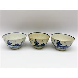 Three late 18th century Pennington Liverpool blue and white tea bowls, and a saucer, circa 1790, decorated in the Lady and servant pattern, with two figures, rockwork and fence, tea bowls D8cm, saucer D13cm