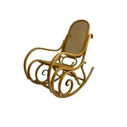 Early to mid-20th century Michael Thonet design bentwood rocking chair, with cane seat and back
