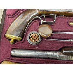 Pair of Continental .44calibre percussion target pistols, each with heavy 23.5cm octagonal to round barrel bearing various marks, crude scroll engraving to lock plate, hammer and octagonal section of barrel, unchequered walnut stock with brass butt plate and steel hooked trigger guard, numbered 8138 & 8164, L41.5cm overall; in maroon baize lined converted sapele mahogany fitted case bearing reproduction trade label for Trulock & Son Dublin containing small copper powder flask, steel scissor action bullet mould, nipple key, turned wooden mallet and lidded box, steel rammer and wooden cleaning rod, case L48cm