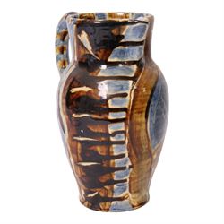 David Garland (b.1941) jug, decorated in a blue and brown glaze, with leaves and abstract patterns, H27cm
