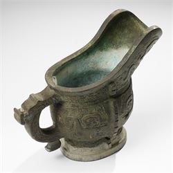 Chinese archaistic bronze wine vessel, Shang dynasty style but 20th century, W25cm; together with a Tang dynasty style model of a rearing horse, H17.5cm (2)