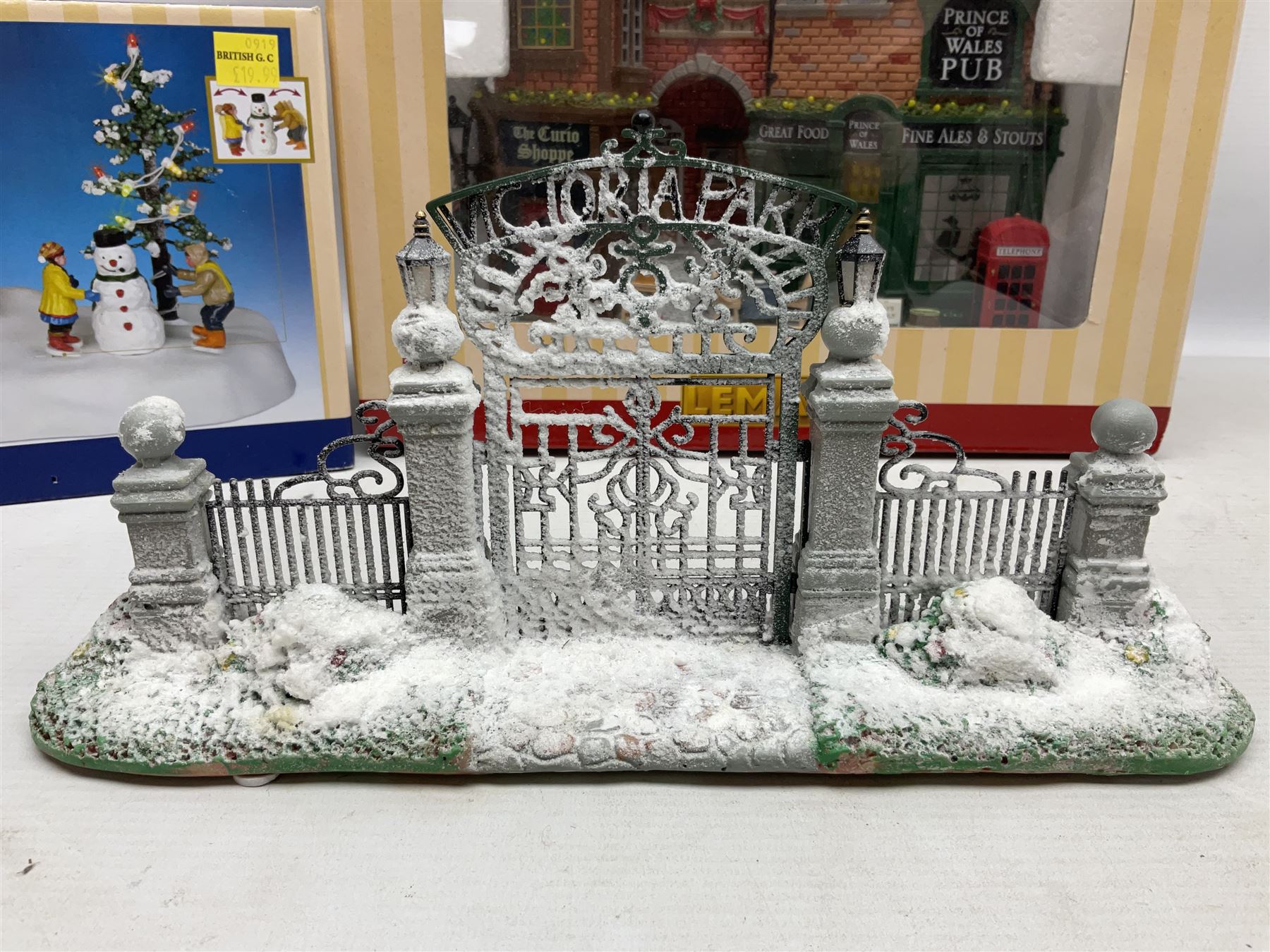 Christmas decorations; Lamax light up English Lane wall hanging, together with Lemax Frolic in the snow, Victorian parkway and other christmas signs and figures