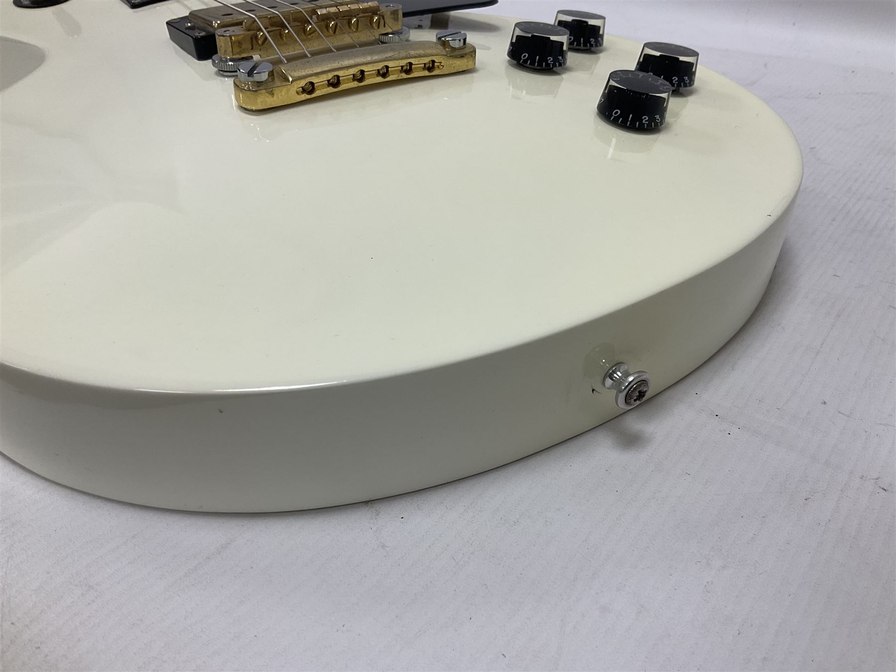 2010 Gibson Les Paul studio guitar, serial no101500537 in white finish with gold and pale green hardware, in Auden soft carry case, guitar L100cm