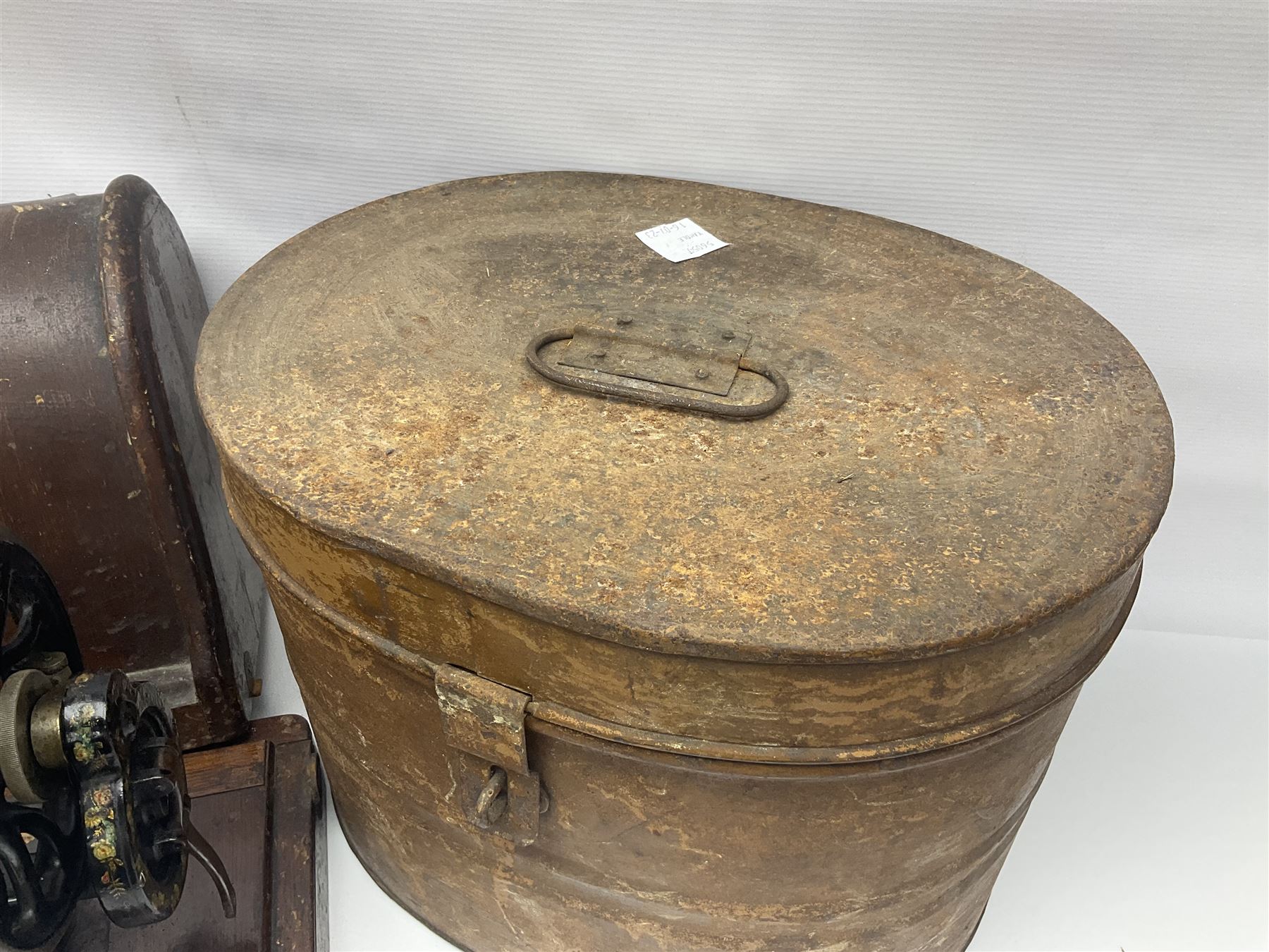 Metal hat box, together with another metal traveling case and a singer sewing machine 