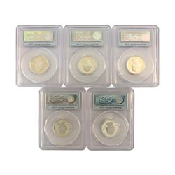 Five United States of America first strike silver twenty-five cent coins, each encapsulated and graded by PCGS