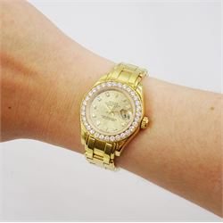 Rolex Oyster Perpetual Datejust Pearlmaster ladies 18ct gold automatic wristwatch, Ref. 69298, Serial No. T293223, champagne dial with diamond hour markers and diamond set bezel, on original 18ct Pearlmaster bracelet with fold-over clasp, with papers