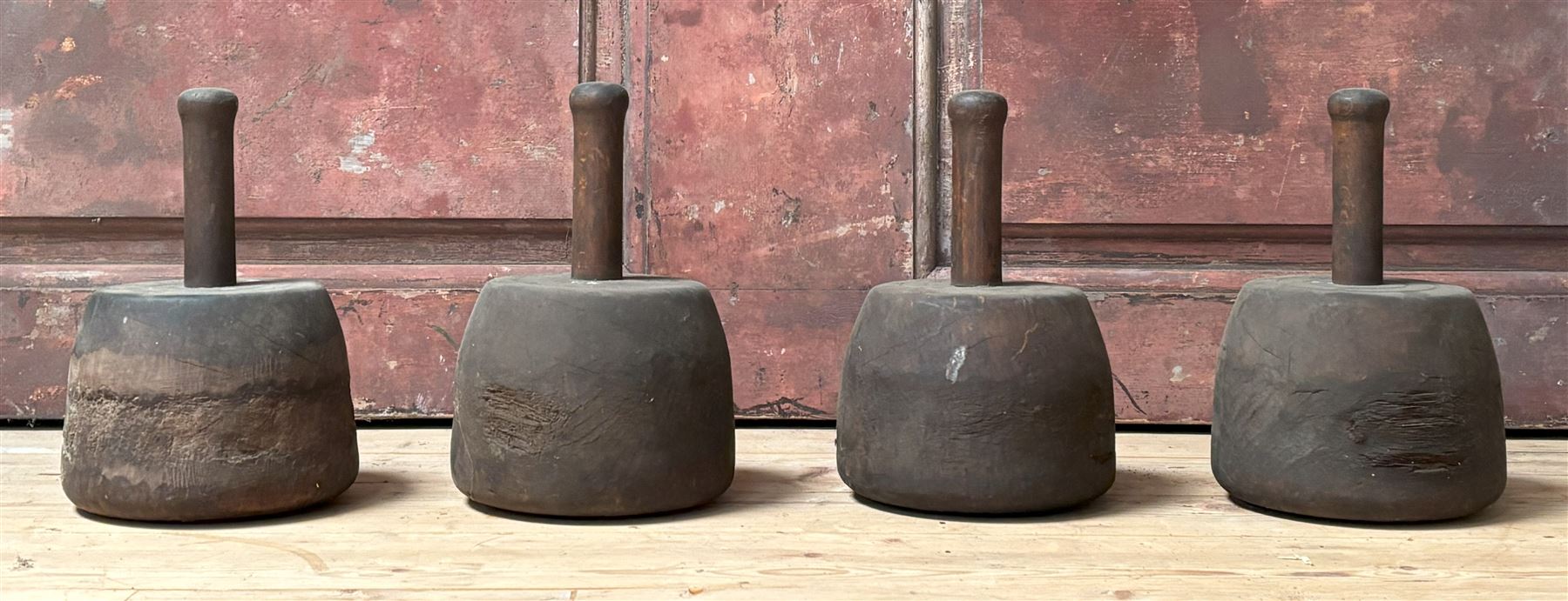 Set of four large turned treen mallets, late 19th century. H25cm - COLLECTION BY APPOINTMENT FROM: The White House, Thirsk Road, Easingwold, York, YO61 3NF - CALL 01723 507111 TO ARRANGE