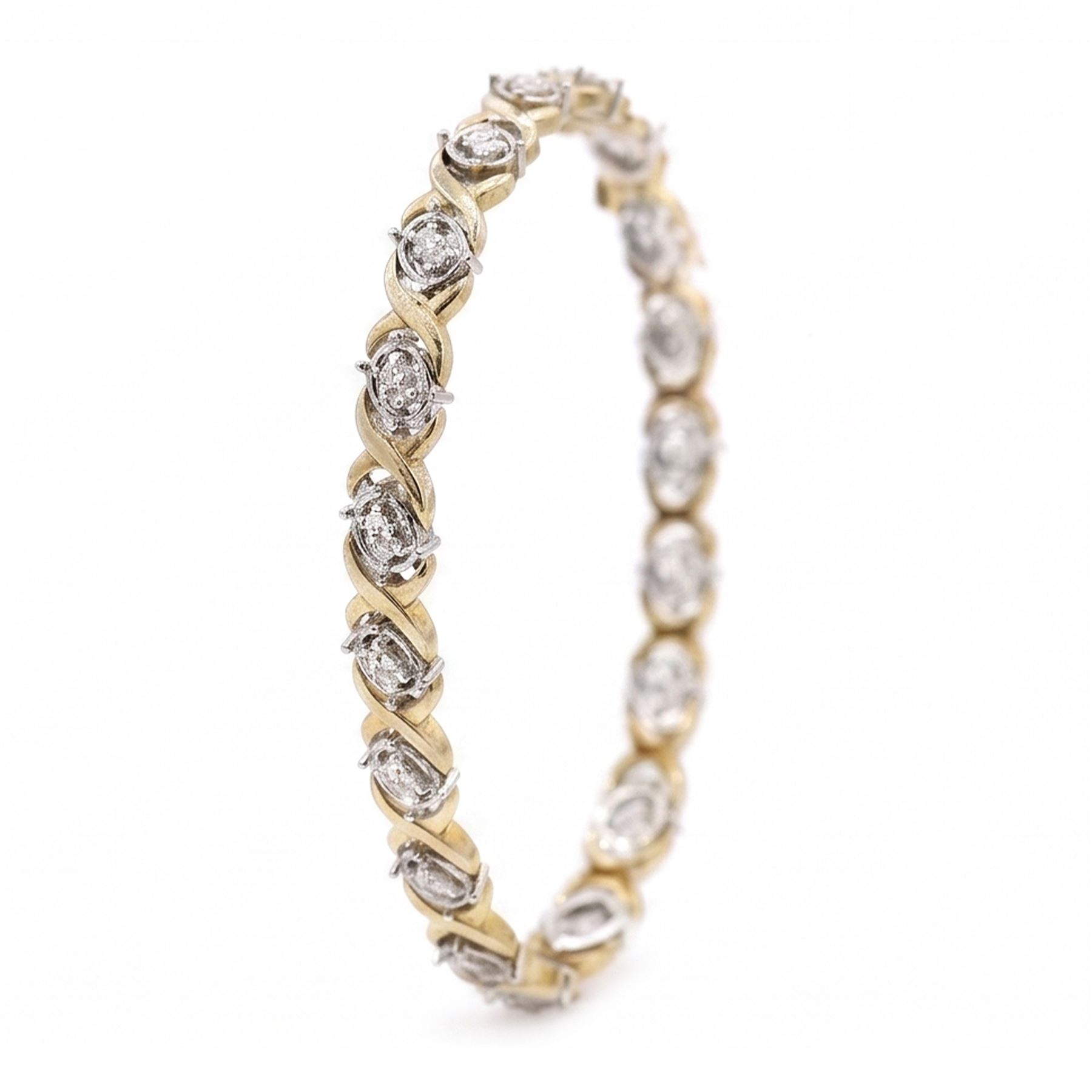 14ct white and yellow gold diamond fancy link bracelet, set with thirty-eight round brilliant cut diamonds, stamped, total diamond weight approx 1.15 carat