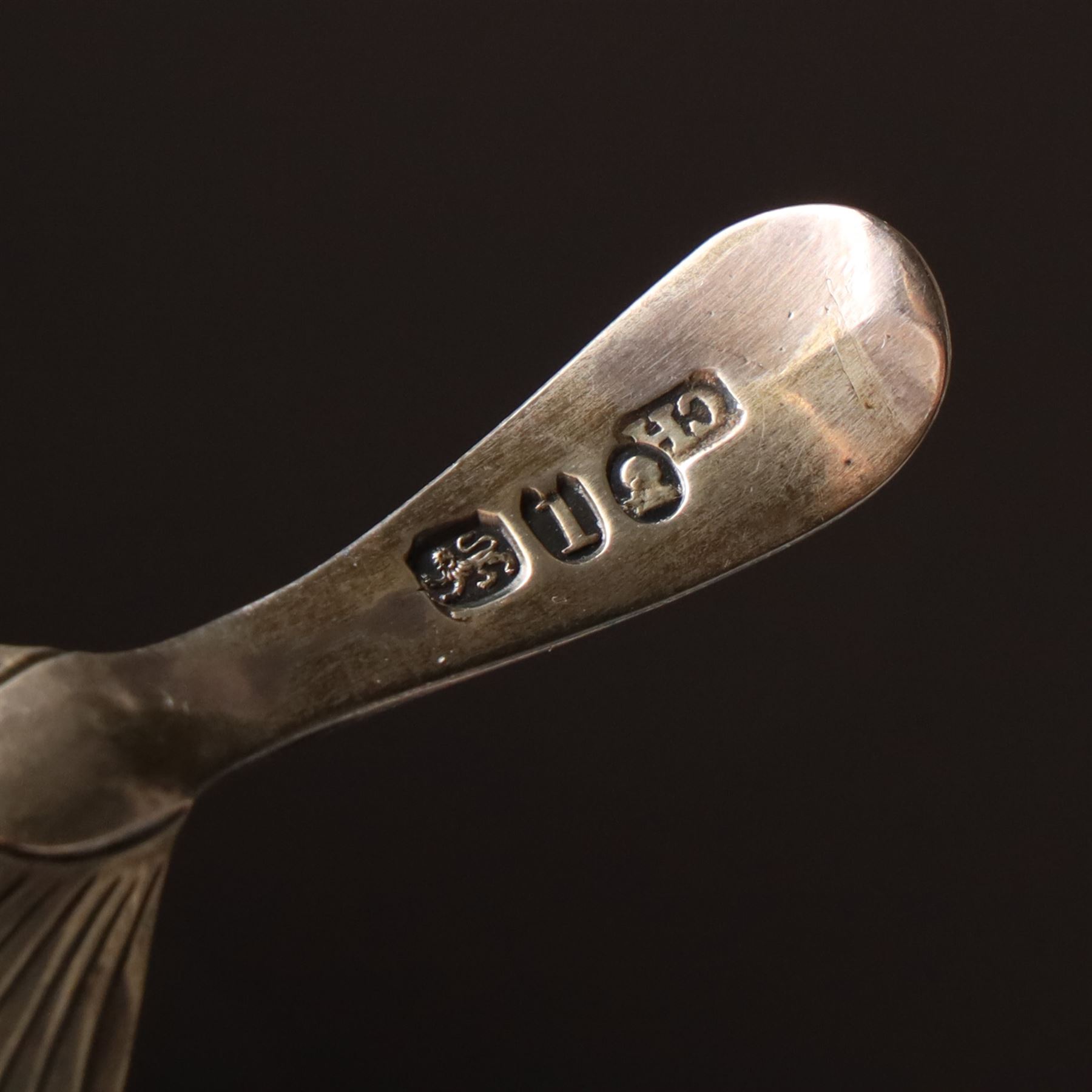 Early 19th century silver caddy spoon, Elizabeth II caddy spoon, various silver condiment spoons, sugar tongs, napkin ring, other silver cutlery and a silver paper knife, boxed