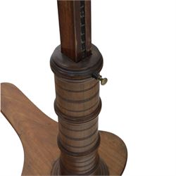 Late Victorian mahogany adjustable reading stand, the rectangular top with moulded and rounded edge and gallery upon a adjustable turned column support, and shaped base