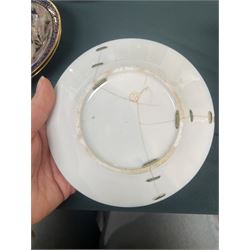 English porcelain Imari tea and coffee wares, pattern 1277, decorated with central orange floral motif surrounded by sprigs of yellow foliage within blue borders, comprising eleven teacups, eight coffee cups, twelve saucers, two shallow bowls and one finger bowl