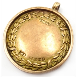  9ct gold 1925 Scarborough and District  football medal by Fattorini and an Arts and Crafts silver and enamel brooch by Charles Horner  