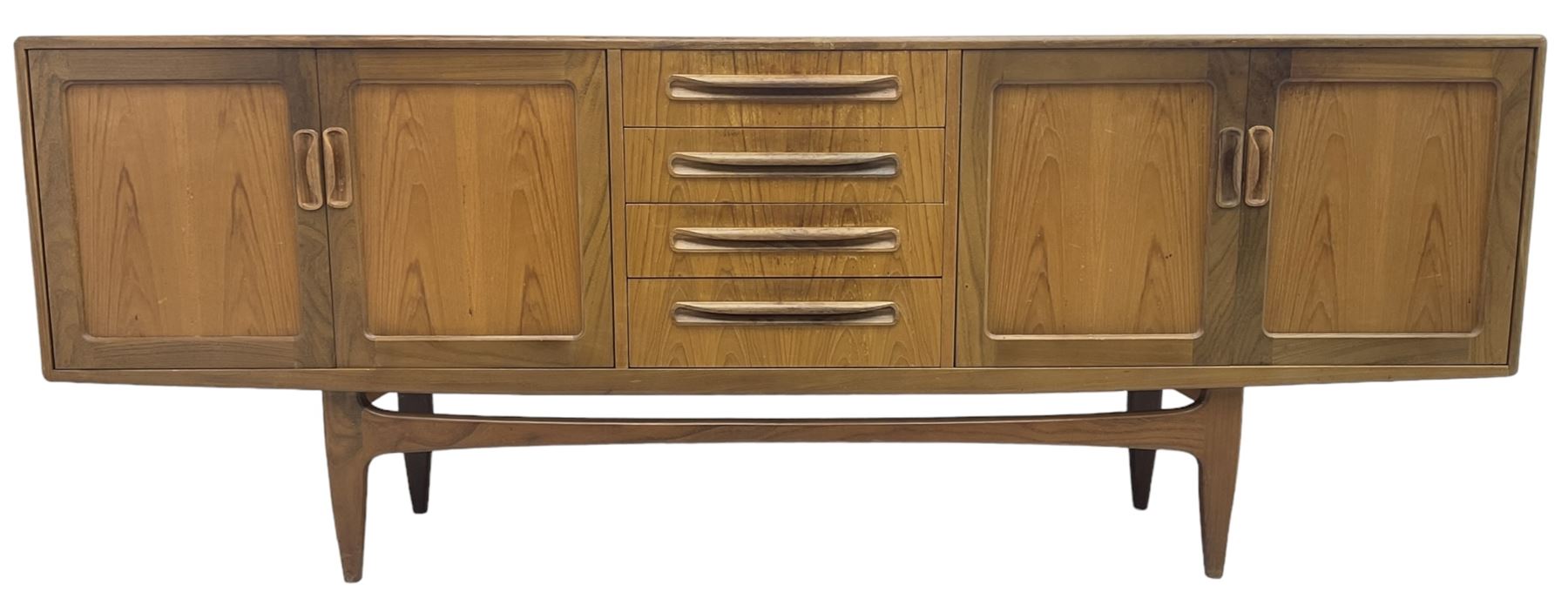 G-Plan – teak sideboard, four central drawers flanked by two double cupboards, enclosed by panelled doors 
