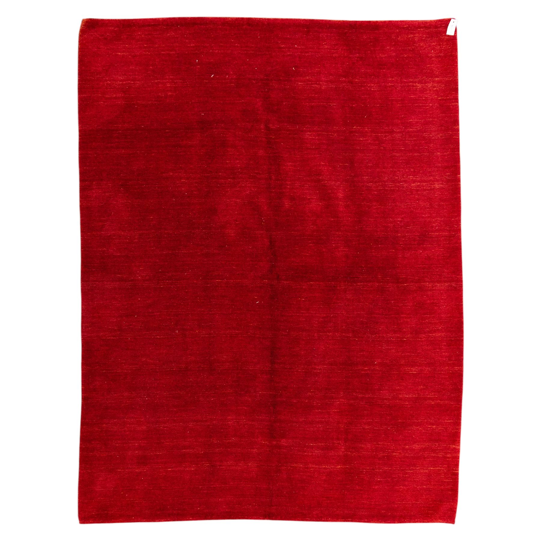 Indian hand-knotted wool Gebbeh design carpet, of rectangular form, woven in a rich madder red tone