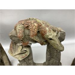 Seven Terry Pratchett Discworld figures by Clarecraft, to include The Luggage DW04M Smugli D990, pair of Home Sweet Home bookends, wall hanging modelled as a dragon upon stone plinth etc, tallest H19cm