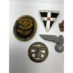Six WW2 German badges - cap badge D.A.F. labour front; SS skull cap insignia First pattern 1925-35; Frauenschen Mother's Union; tank driver collar badge 1939-42; N.S.K.K. cycle corps; and officer's cap insignia 1940-42 (6)