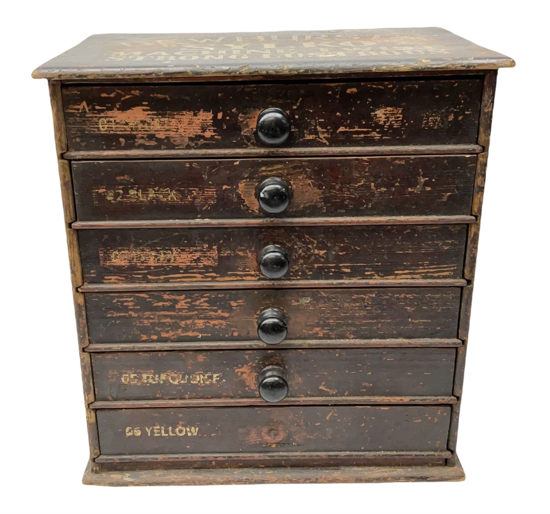 Early 20th Century Dewhurst table top chest, decorated with gilded 'Dewhurst's Sylko Machine Twist Strong Lustrous' lettering above six long drawers with names and numbers of cotton also detailed in gilt, H39cm