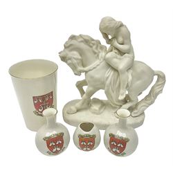 W.H.Goss Parian figure of Lady Godiva, with printed mark beneath, together with a W.H.Goss crested ware Rivaulx Abbey tumbler, and three similar Waterfall Heraldic China crested ware items, Godiva H19cm 