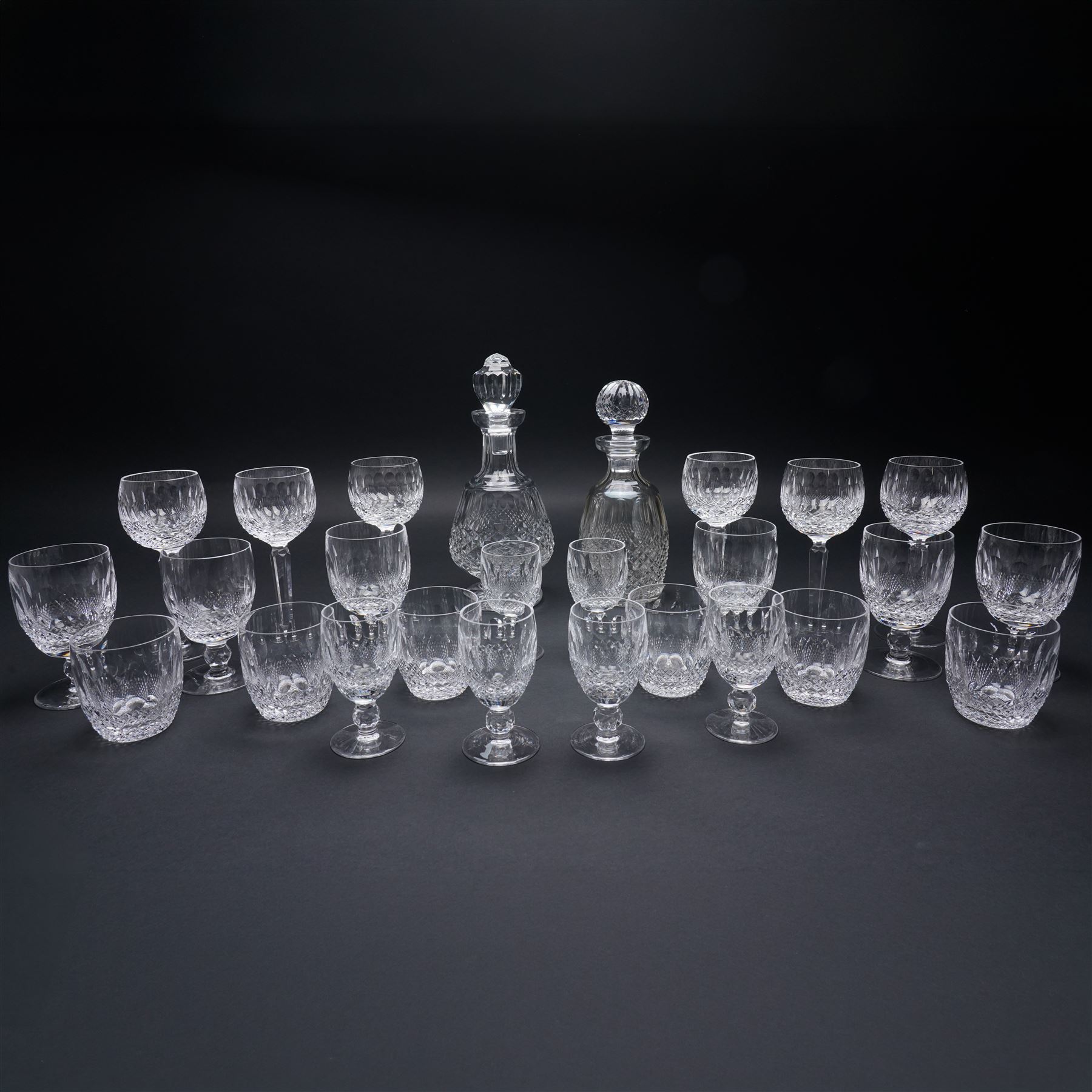 Suite of Waterford Colleen pattern table glass comprising six claret glasses, six hock glasses, six small tumblers, six sherry glasses and two decanters