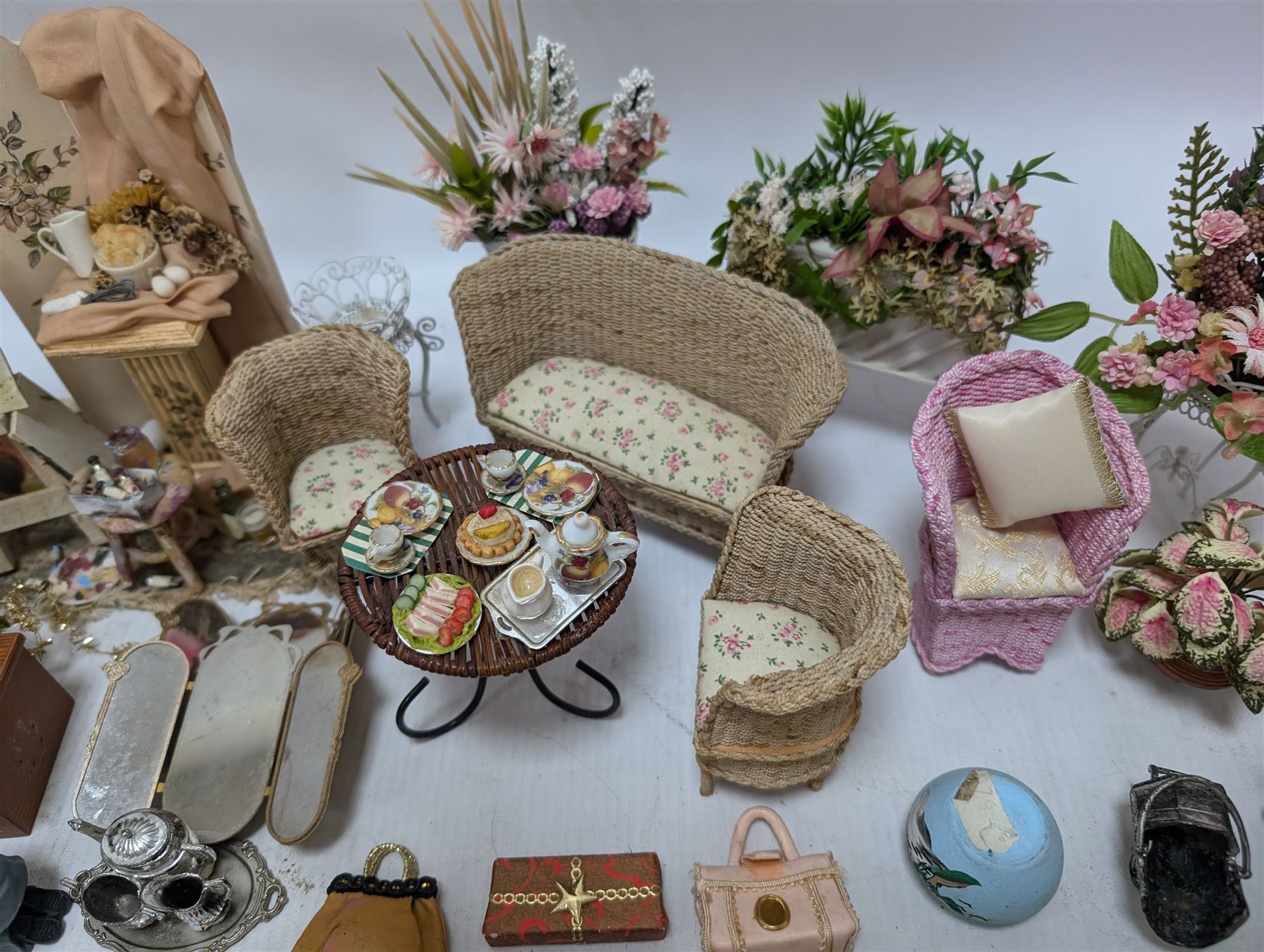 Dolls house conservatory and garden accessories, including sofa and chairs, trees, plants, paintings, Christmas decorations, etc 